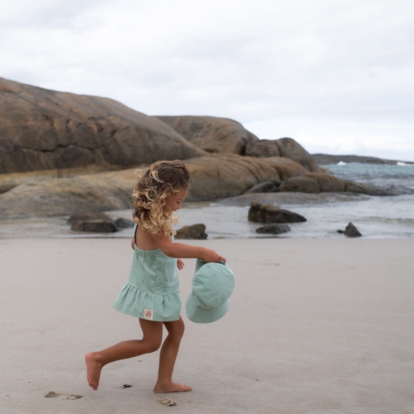 Gots certified organic cotton, ethical and sustainable fashion for babies and toddler, ocean green, reef-friendly fashion, Australian small business, corduroy for babies, baby toddler corduroy dress, retro dress, button dress with pockets