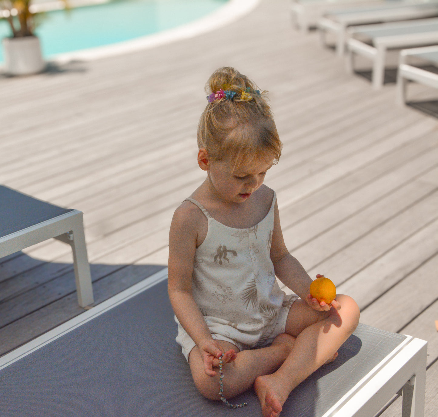Gots certified organic cotton, ethical and sustainable fashion for babies and toddler, reef-friendly fashion, Australian small business , green reef co, minimalistic fashion, capsule wardrobe for toddler, summer capsule, baby romper with stripes and reef prints, lightweight, breathable cotton, jumpsuit, playsuit onesie for toddlers and girls