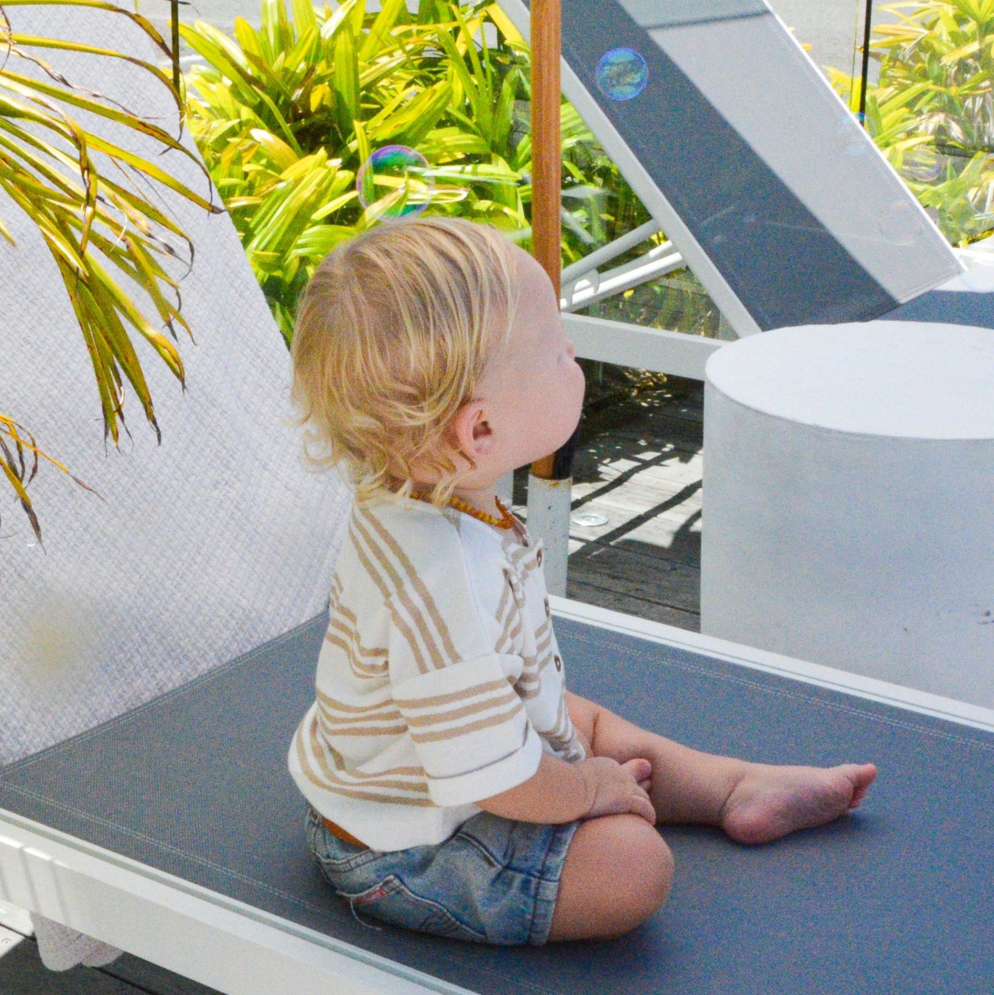 Gots certified organic cotton, ethical and sustainable fashion for babies and toddler, reef-friendly fashion, gender neutral, Australian small business , green reef co, minimalistic fashion, capsule wardrobe for toddler, summer capsule, baby romper with stripes and reef prints, lightweight, breathable cotton, t-shirt with stripes