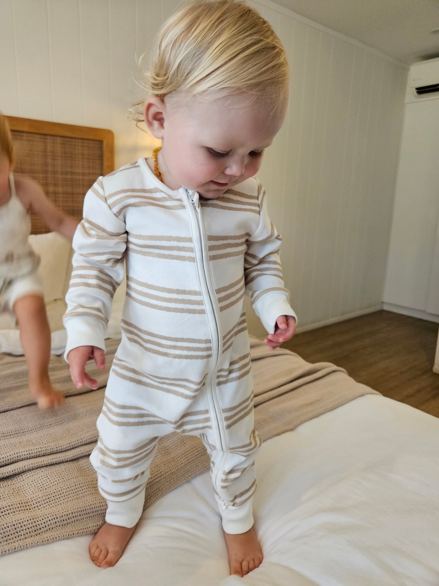 Gots certified organic cotton, ethical and sustainable fashion for babies and toddler,  gender neutral, reef-friendly fashion, Australian small business , green reef co, minimalistic fashion, capsule wardrobe for toddler, summer capsule, baby romper with stripes and reef prints, lightweight, breathable cotton, organic cotton zip suit, growsuit for, romper for babies