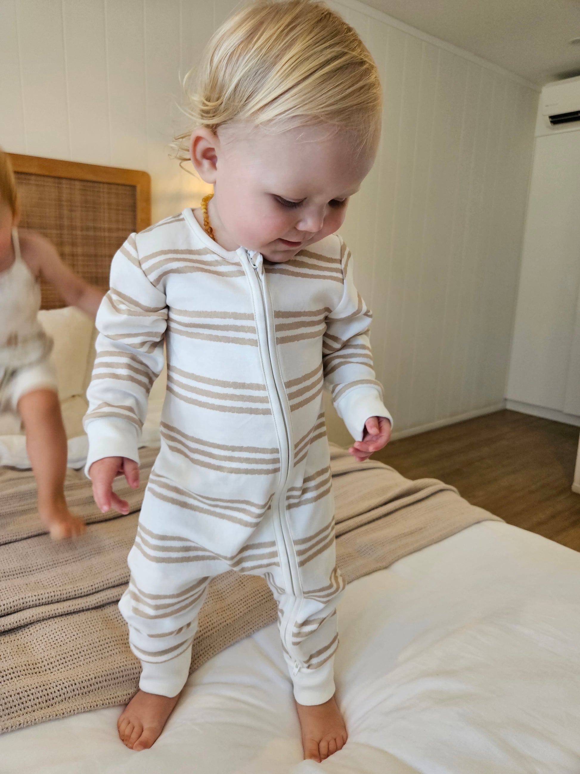 Gots certified organic cotton, ethical and sustainable fashion for babies and toddler,  gender neutral, reef-friendly fashion, Australian small business , green reef co, minimalistic fashion, capsule wardrobe for toddler, summer capsule, baby romper with stripes and reef prints, lightweight, breathable cotton, organic cotton zip suit, growsuit for, romper for babies