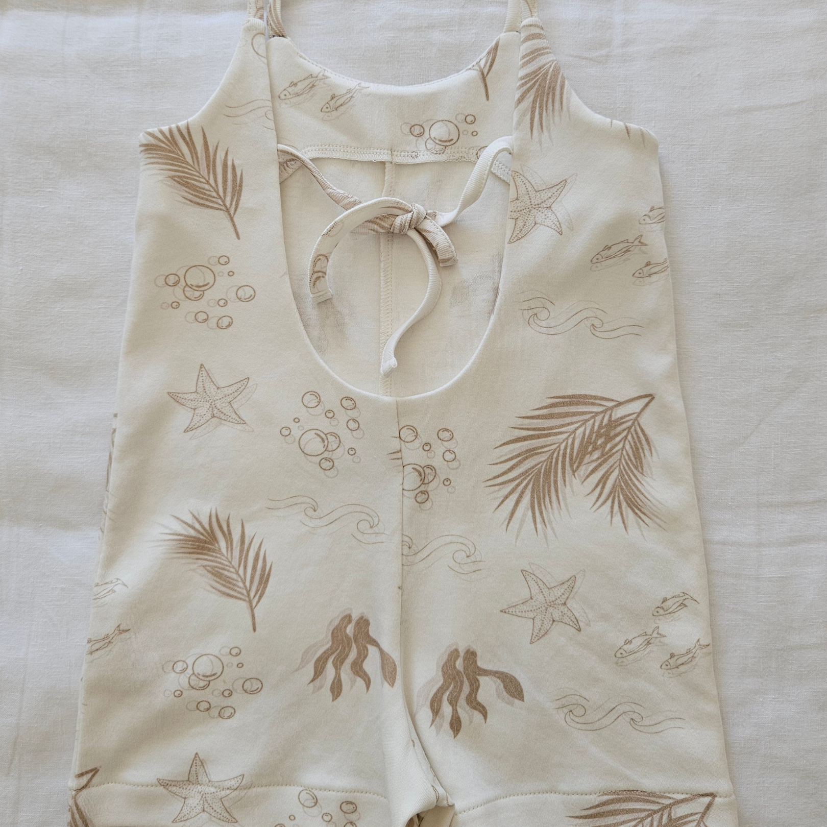 Gots certified organic cotton, ethical and sustainable fashion for babies and toddler, reef-friendly fashion, Australian small business , green reef co, minimalistic fashion, capsule wardrobe for toddler, summer capsule, baby romper with stripes and reef prints, lightweight, breathable cotton, holiday summer playsuit jumpsuit onesie for girls
