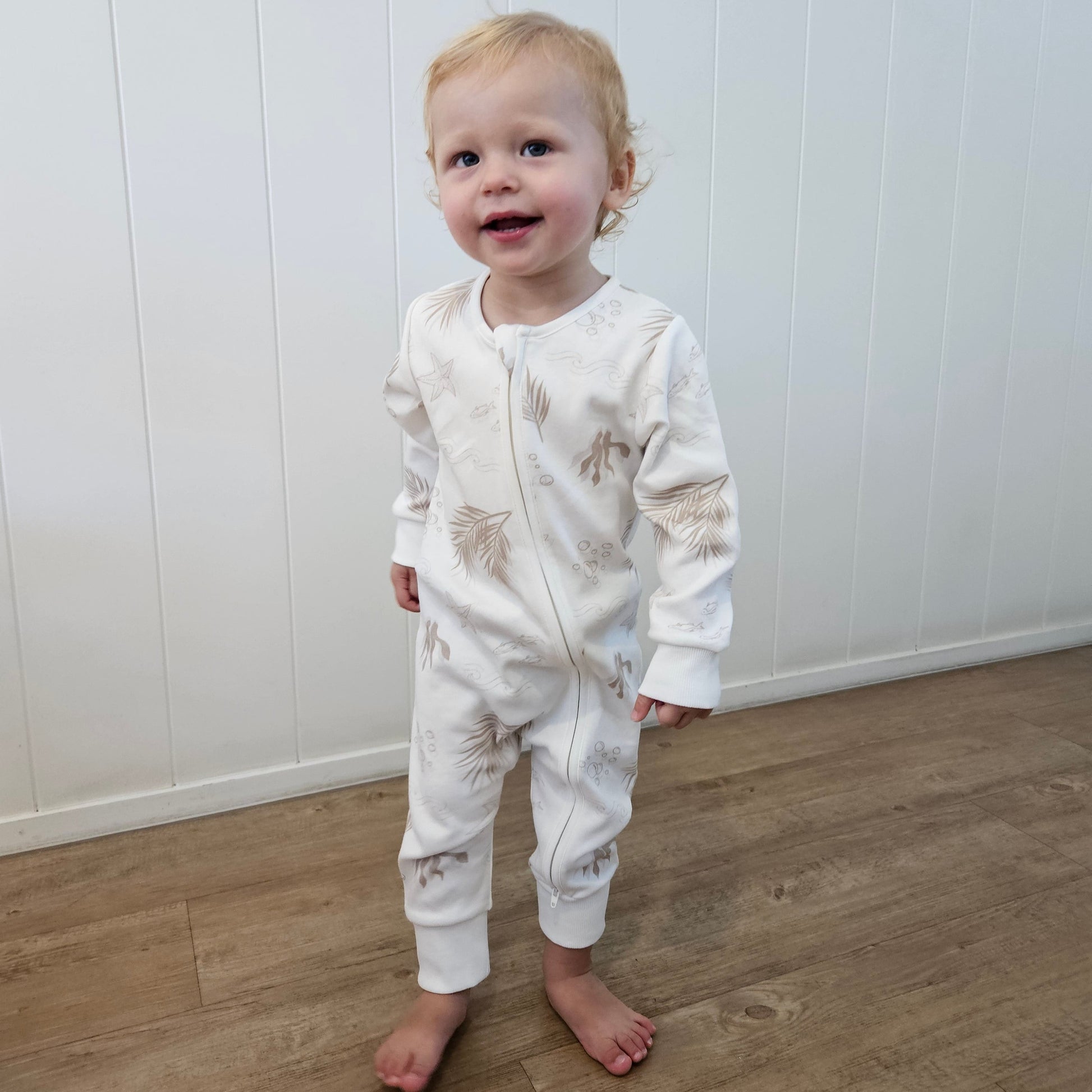 Gots certified organic cotton, ethical and sustainable fashion for babies and toddler, gender neutral, reef-friendly fashion, Australian small business , green reef co, minimalistic fashion, capsule wardrobe for toddler, summer capsule, baby romper with stripes and reef prints, lightweight, breathable cotton, organic cotton zip suit, growsuit for, romper for babies