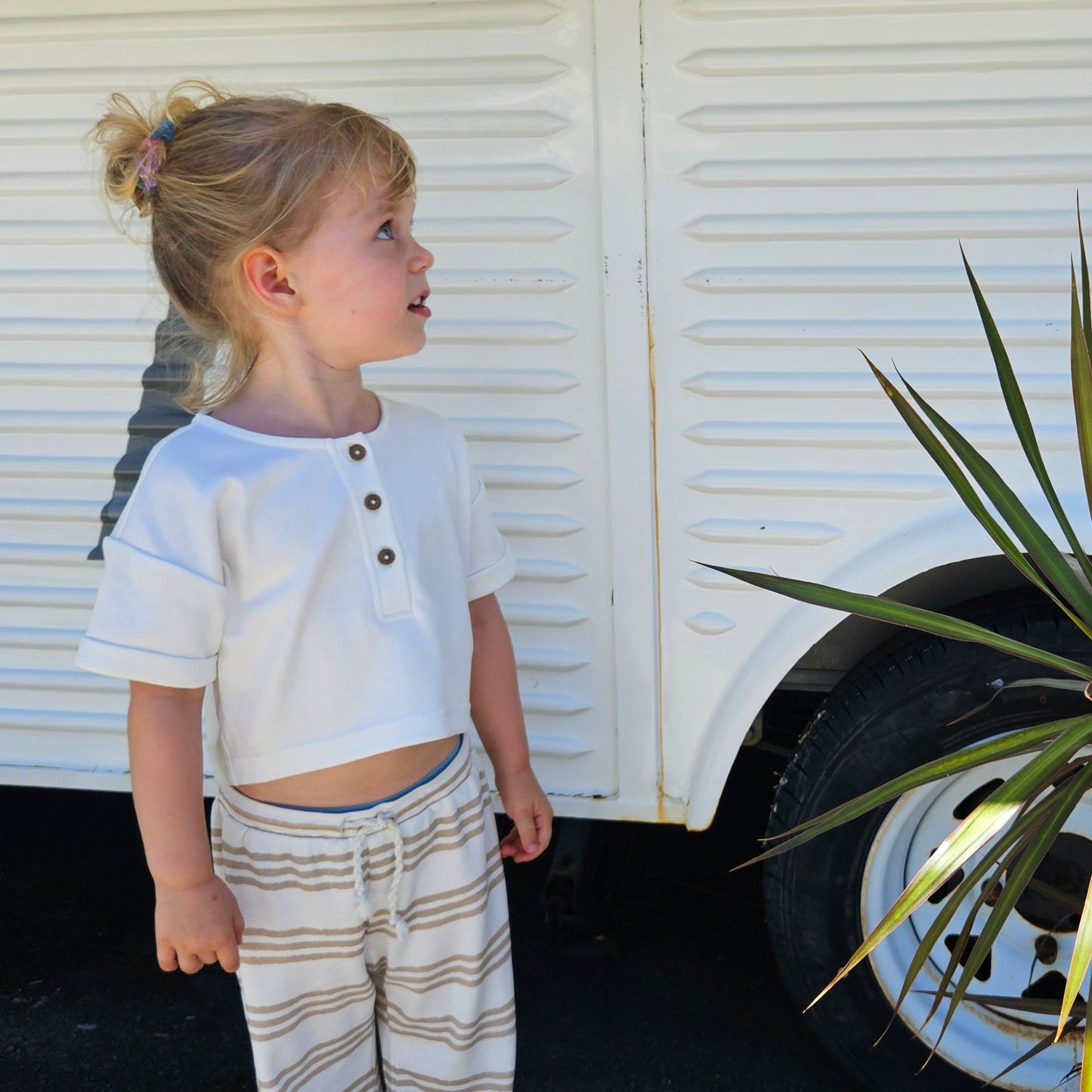 Gots certified organic cotton, ethical and sustainable fashion for babies and toddler, reef-friendly fashion, gender neutral, Australian small business , green reef co, minimalistic fashion, capsule wardrobe for toddler, summer capsule, lightweight, breathable cotton, basic white tee for girls and boys